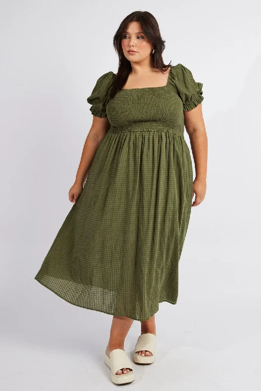 Midi dresses with pom - pom trims for a playful and festive look Green Midi Dress Short Sleeve Shirred Midi dresses with pom - pom trims for a playful and festive look Green Midi Dress Short Sleeve Shirred