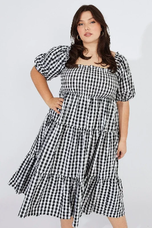 Midi dresses with gathered skirts for a full and flowing silhouette Black Check Midi Dress Short Sleeve Shirred Tie Back Midi dresses with gathered skirts for a full and flowing silhouette Black Check Midi Dress Short Sleeve Shirred Tie Back