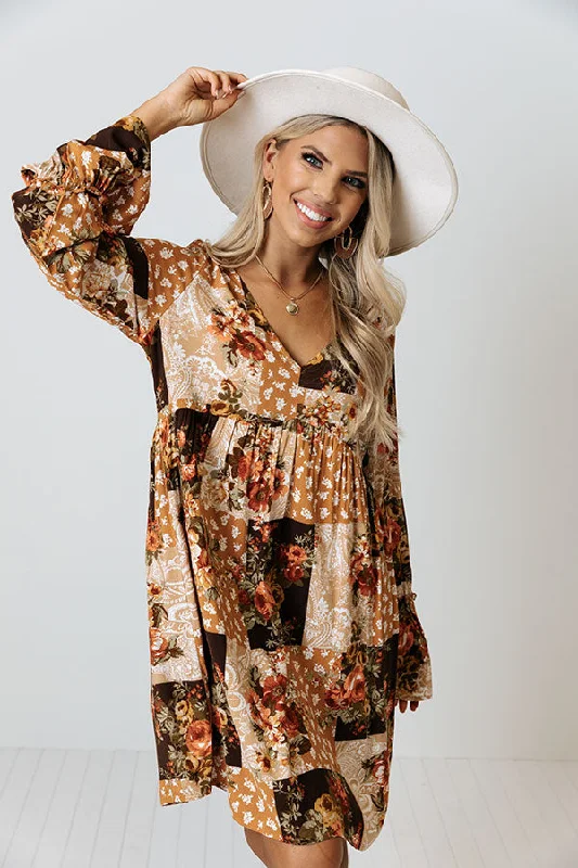 Mini dresses with fringe for a bohemian style Caramel Spiced Kisses Babydoll Dress