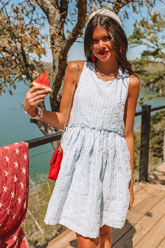 Mini dresses with pleated skirts for a classic look High Noon Stripe Dress