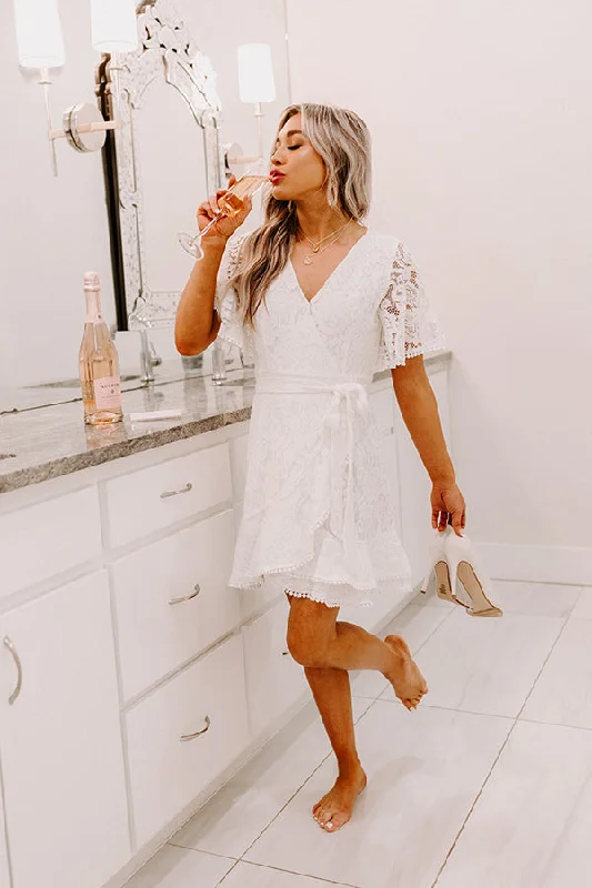 Mini dresses with pom - pom trims for a playful feel Seal My Fate Lace Dress