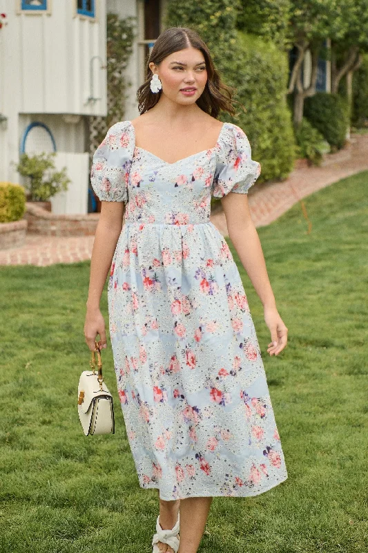 Maxi - inspired midi dresses with flowing fabrics for a beachy vibe Josie Eyelet Floral Alessi Puff Sleeve Midi Dress Maxi - inspired midi dresses with flowing fabrics for a beachy vibe Josie Eyelet Floral Alessi Puff Sleeve Midi Dress