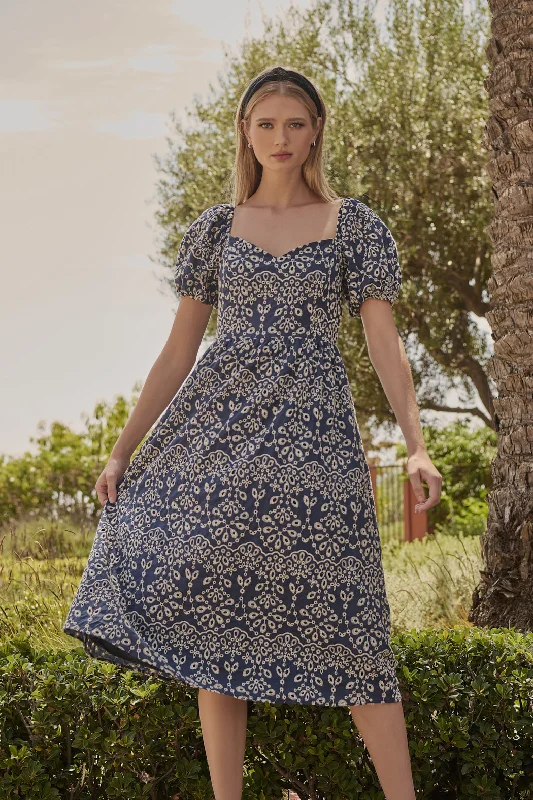 Midi dresses with asymmetric hems for a fashion - forward and dynamic appearance Viridiana Floral Eyelet Alessi Puff Sleeve Midi Dres Midi dresses with asymmetric hems for a fashion - forward and dynamic appearance Viridiana Floral Eyelet Alessi Puff Sleeve Midi Dres