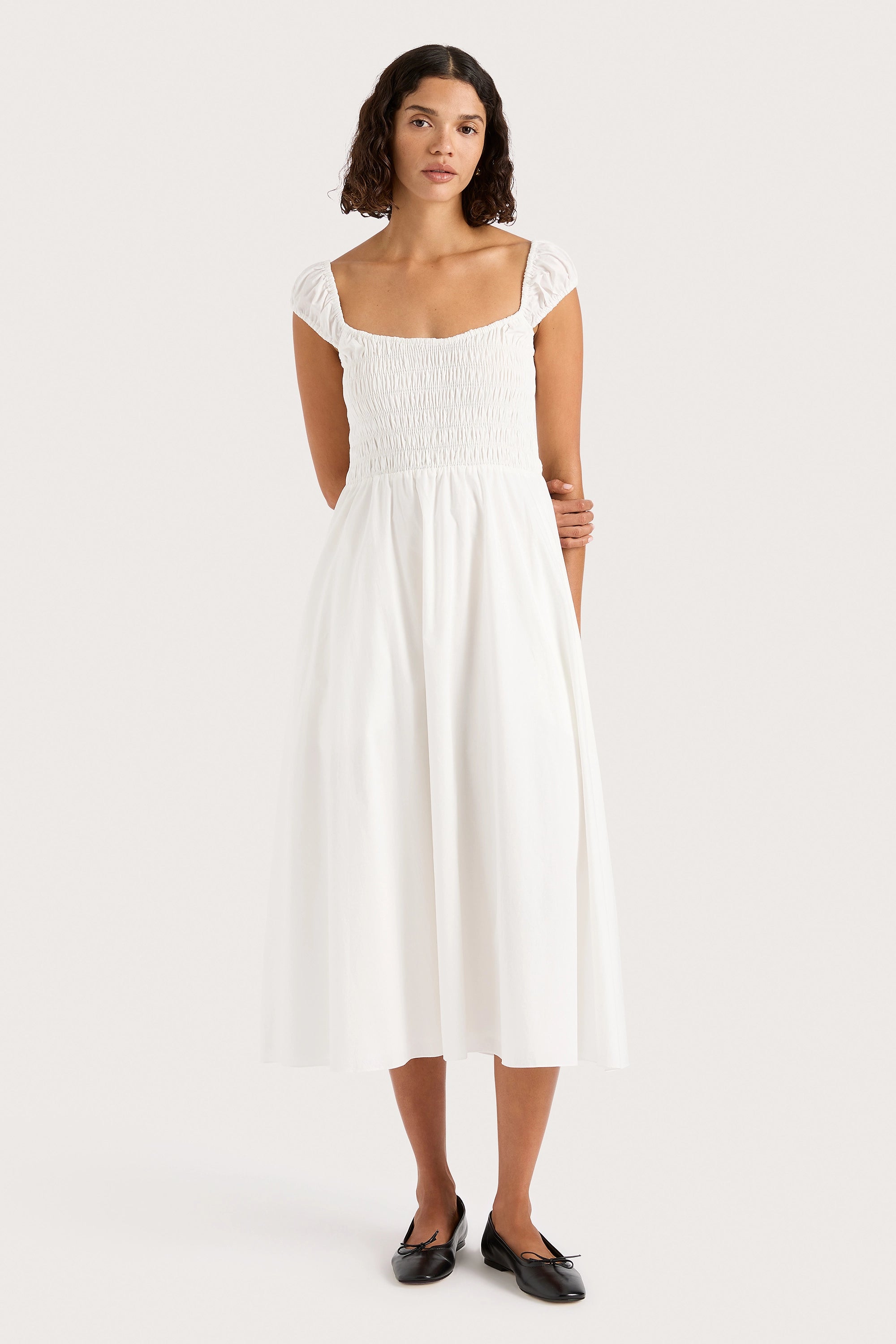 Midi dresses with asymmetric hems for a fashion - forward and dynamic appearance Lene Midi Dress White Midi dresses with asymmetric hems for a fashion - forward and dynamic appearance Lene Midi Dress White
