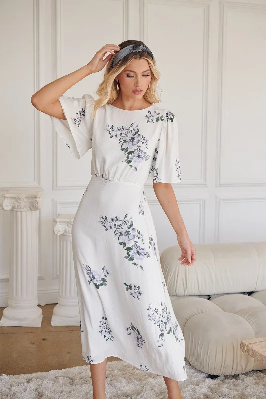 Midi dresses with ruched sleeves for a more fitted and stylish arm look Porto Floral Smocked Midi Dress Midi dresses with ruched sleeves for a more fitted and stylish arm look Porto Floral Smocked Midi Dress