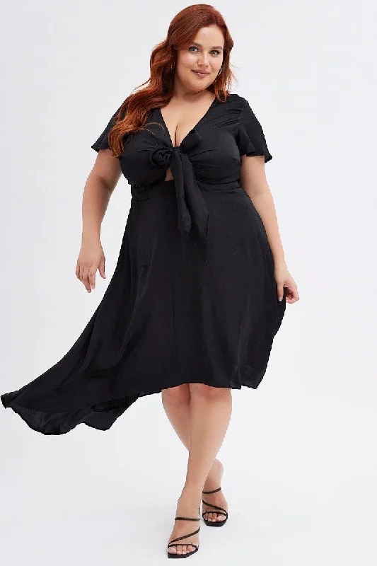 Midi dresses with geometric cutouts for a contemporary and edgy look Black Midi Dress Short Sleeve Tie Back Satin Midi dresses with geometric cutouts for a contemporary and edgy look Black Midi Dress Short Sleeve Tie Back Satin