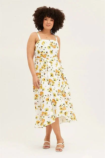 Midi dresses with geometric cutouts for a contemporary and edgy look Floral Print Sleeveless Ruffle Midi Dress Midi dresses with geometric cutouts for a contemporary and edgy look Floral Print Sleeveless Ruffle Midi Dress