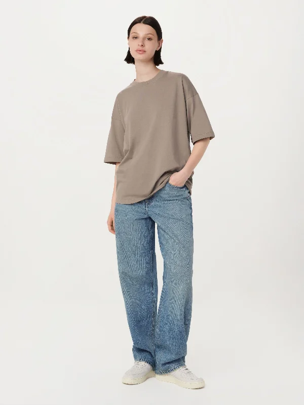 Women's quilted puffer jackets in a cropped silhouette for a modern twist The Loose T-Shirt in Taupe Women's quilted puffer jackets in a cropped silhouette for a modern twist The Loose T-Shirt in Taupe