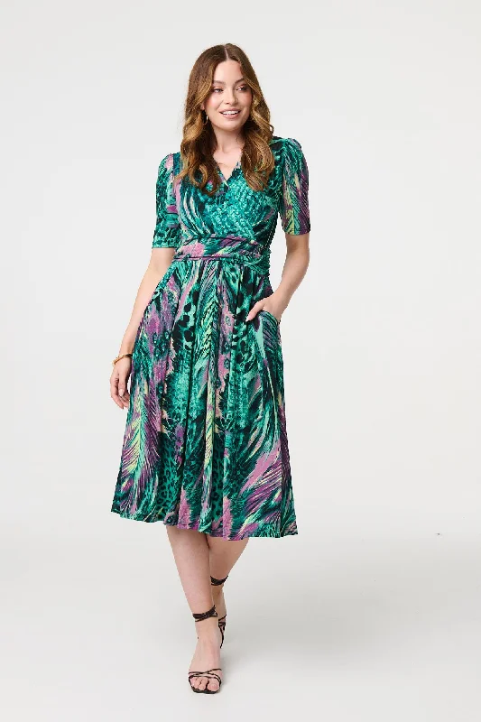 Midi dresses with embroidered accents for a unique and detailed design Feather Print 1/2 Sleeve Wrap Midi Dress Midi dresses with embroidered accents for a unique and detailed design Feather Print 1/2 Sleeve Wrap Midi Dress