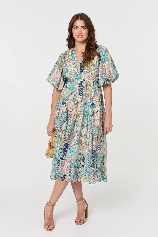 Midi dresses with keyhole backs for a flirty and unexpected detail Patchwork Print 1/2 Puff Sleeve Midi Dress Midi dresses with keyhole backs for a flirty and unexpected detail Patchwork Print 1/2 Puff Sleeve Midi Dress