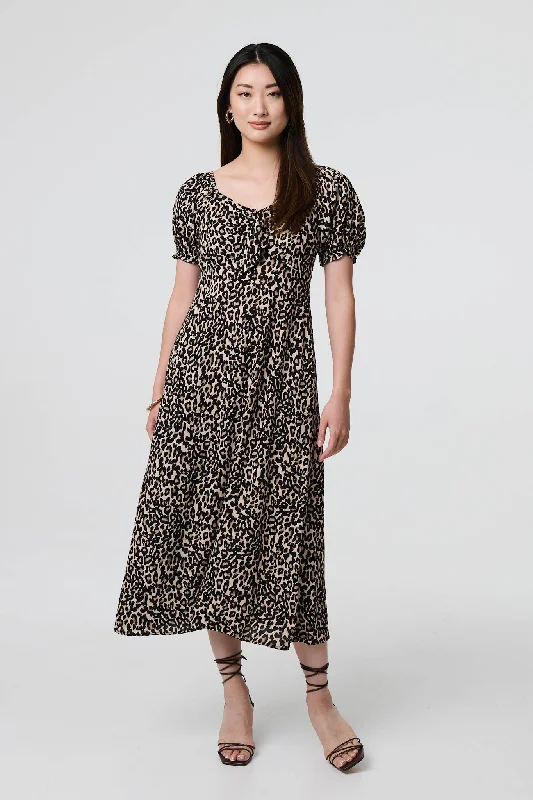 Midi dresses with geometric cutouts for a contemporary and edgy look Animal Print Short Puff Sleeve Maxi Dress Midi dresses with geometric cutouts for a contemporary and edgy look Animal Print Short Puff Sleeve Maxi Dress