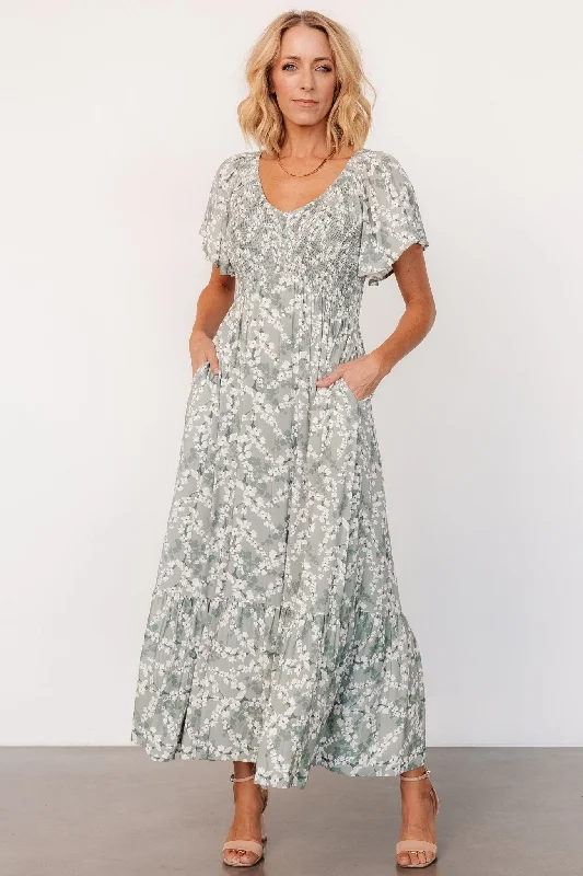 Midi dresses with V - necklines for a flattering and elongating effect Joanie Smocked Dress | Sage + Off White Floral Midi dresses with V - necklines for a flattering and elongating effect Joanie Smocked Dress | Sage + Off White Floral