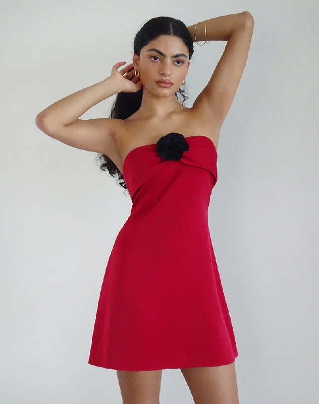 Mini dresses with puff sleeves for a vintage look Ninivala Dress in Red with Black Rosette
