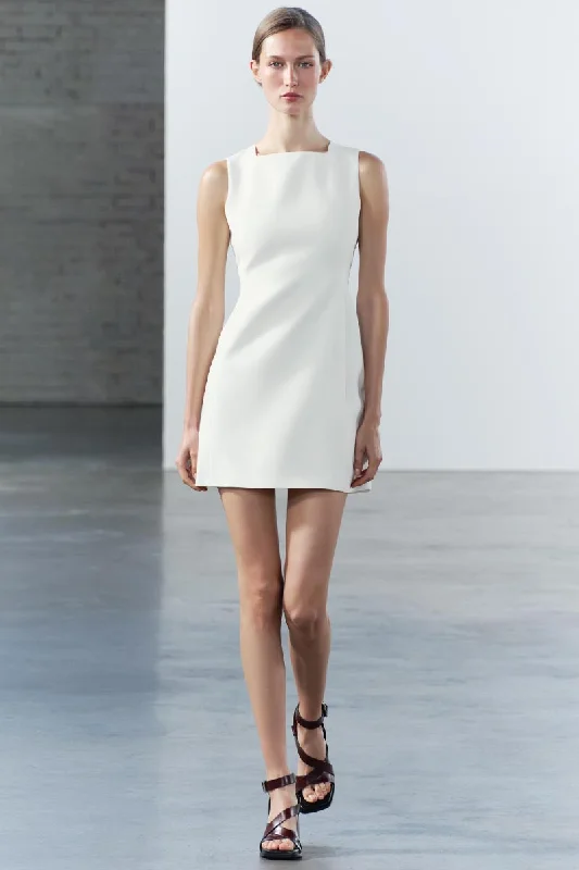 Mini dresses with tassel accents for a fun touch Reyna White Shift Mini Dress