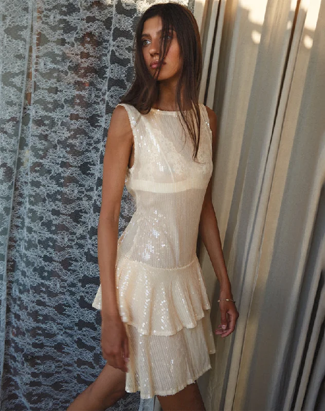 Mini dresses with pleated skirts for a classic look Turtoise Mini Dress in Nude Clear Tinted Disc Mini dresses with pleated skirts for a classic look Turtoise Mini Dress in Nude Clear Tinted Disc