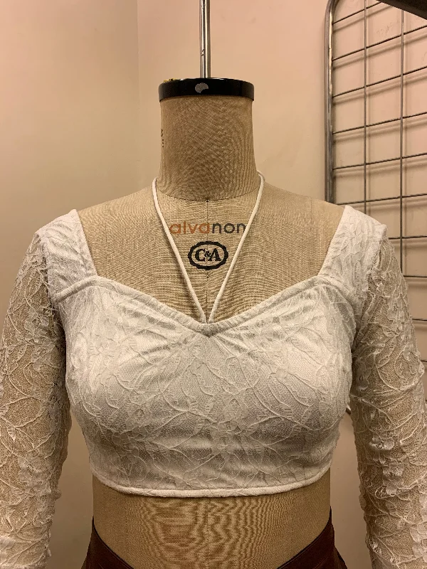 Holiday dresses with sequined and embroidered panels and a high - low hem for a luxurious and trendy holiday design Avie Lace Crop Top Holiday dresses with sequined and embroidered panels and a high - low hem for a luxurious and trendy holiday design Avie Lace Crop Top