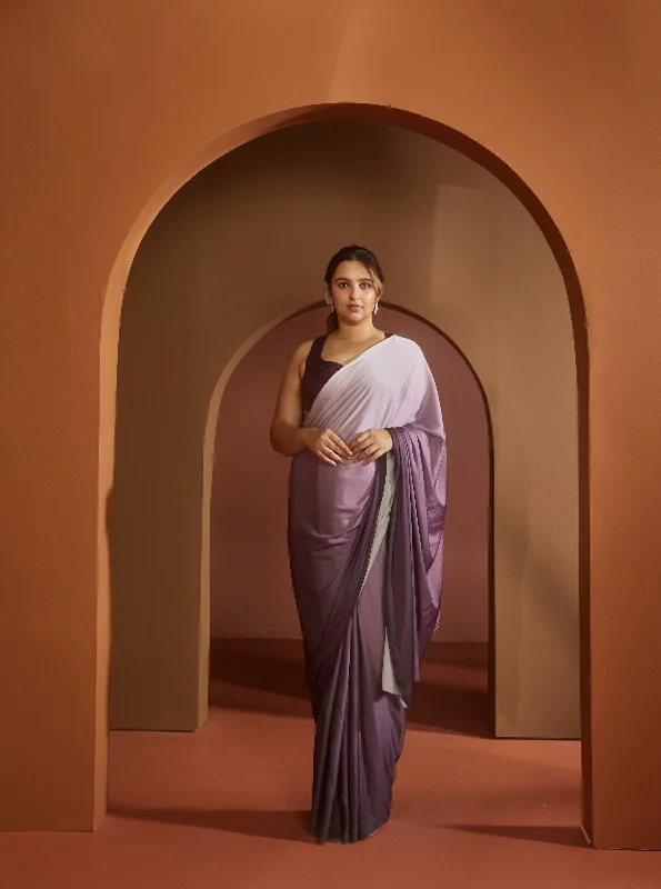Holiday dresses with adjustable spaghetti straps and a ruched bodice for a customizable and flattering holiday fit Yazrin Purple Ombre Satin Pre- Draped Saree Set Holiday dresses with adjustable spaghetti straps and a ruched bodice for a customizable and flattering holiday fit Yazrin Purple Ombre Satin Pre- Draped Saree Set