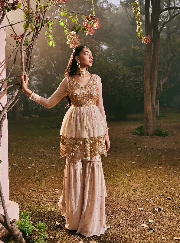 Holiday dresses with a pleated skirt and a button - down front for a timeless and classic holiday look Maira Golden Embroidered Sharara Set Holiday dresses with a pleated skirt and a button - down front for a timeless and classic holiday look Maira Golden Embroidered Sharara Set
