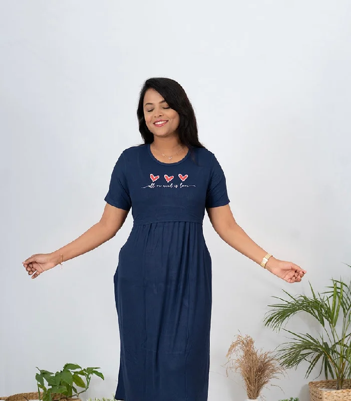 Maternity dress for a baby's first visit to the informal garden Maxi Navy Heart Dress Ribbed light weight(  faded line in the dress so sold at 399₹ )