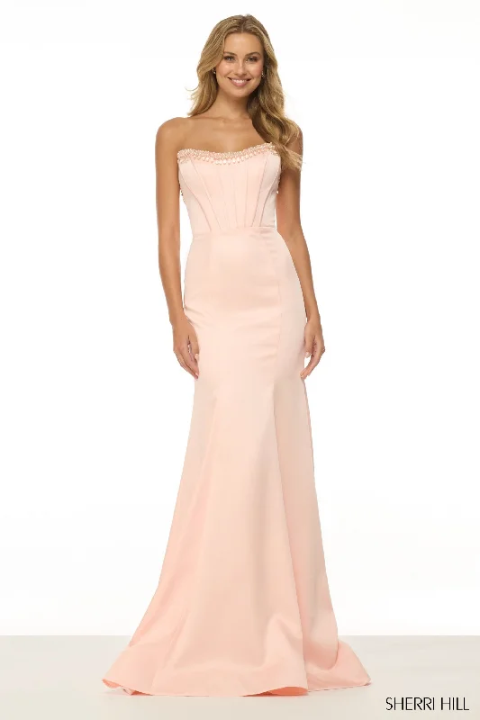 Formal dresses with ruffled skirts and bow accents for a charming prom appearance Sherri Hill 56941 Formal dresses with ruffled skirts and bow accents for a charming prom appearance Sherri Hill 56941